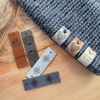 Knitted fabric with various labels on a wooden surface